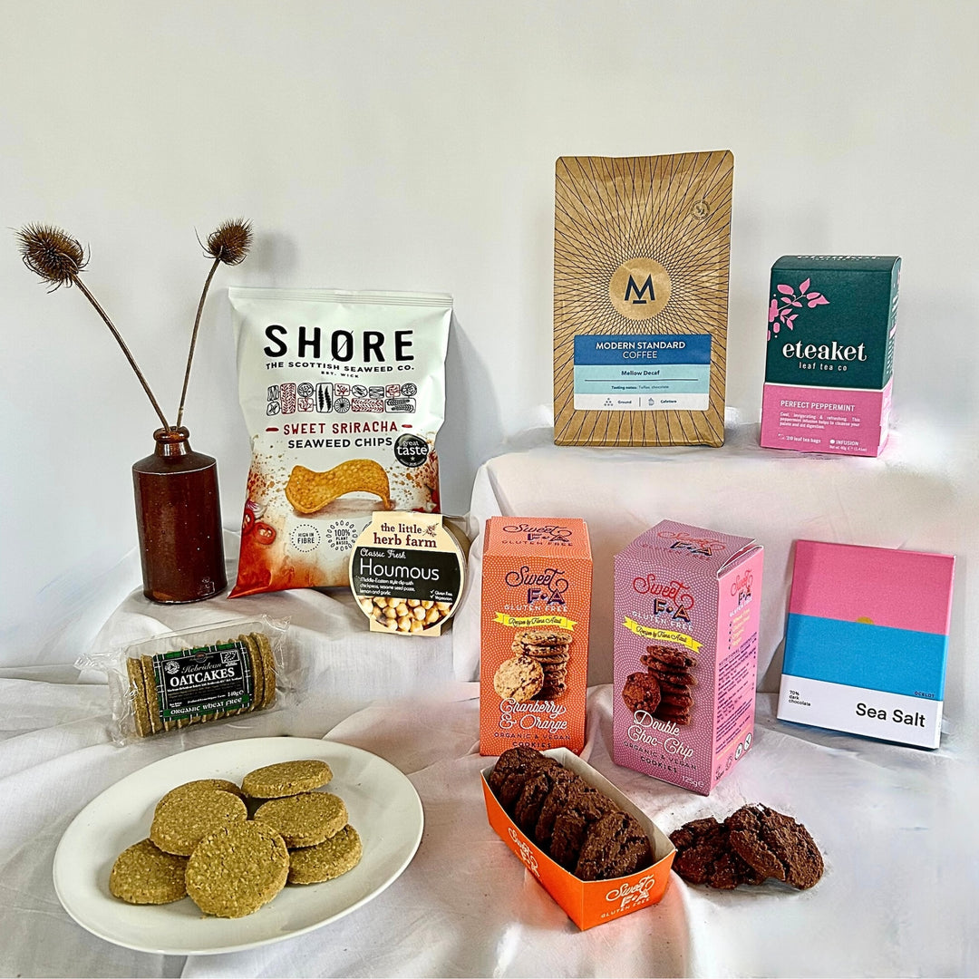 Eight tasty gluten free and vegan foods carefully sourced from tried and trusted artisan suppliers based around Scotland, presented in our exclusive St Andrews Hamper Company canvas tote with shoulder straps.