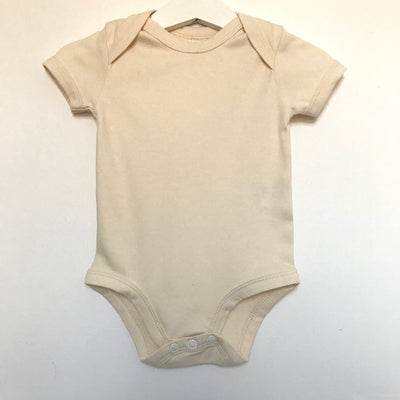 The St Andrews Hamper Company organic cotton bodysuit in natural, undyed, unbleached colour.
