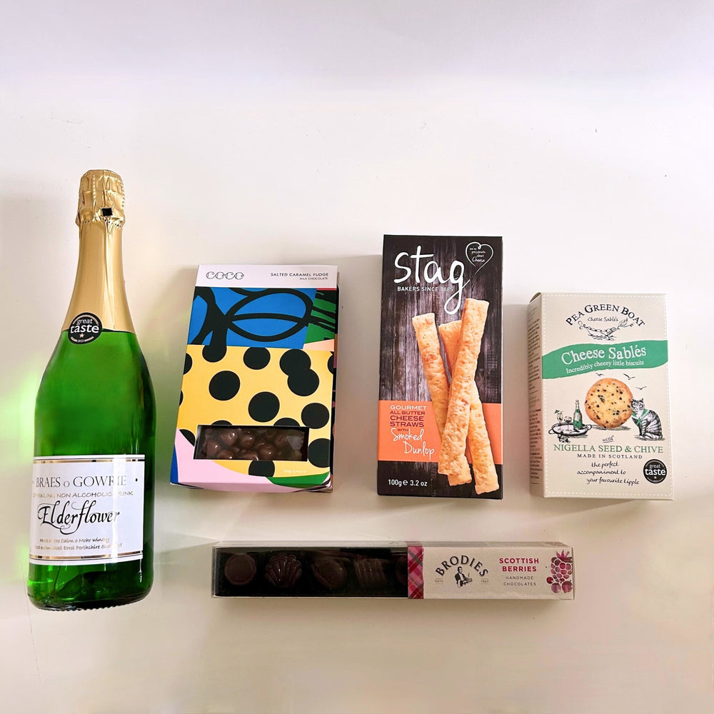 Gift hamper from the St Andrews Hamper Company filled with award-winning alcohol-free sparkling elderflower fizz with a selection of delicious sweet and savoury treats.