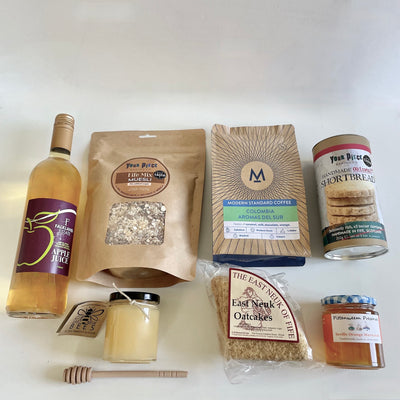 Tastes of Fife Hamper from The St Andrews Hamper Company, with seven tasty eco and organic products made by artisan producers, plus a wooden honey dipper.