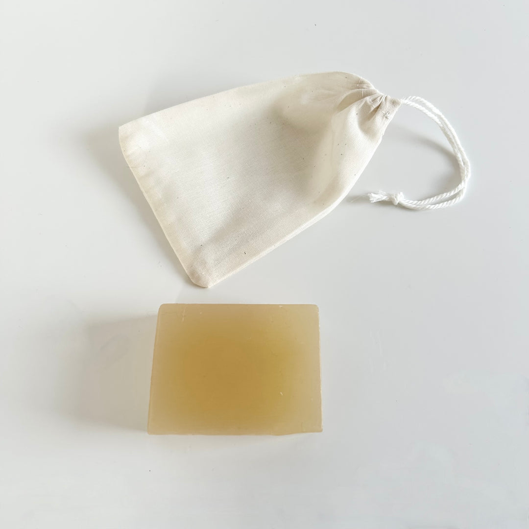 Organic lavender and glycerine baby soap block and cotton drawstring bag from The St Andrews Hamper Company.
